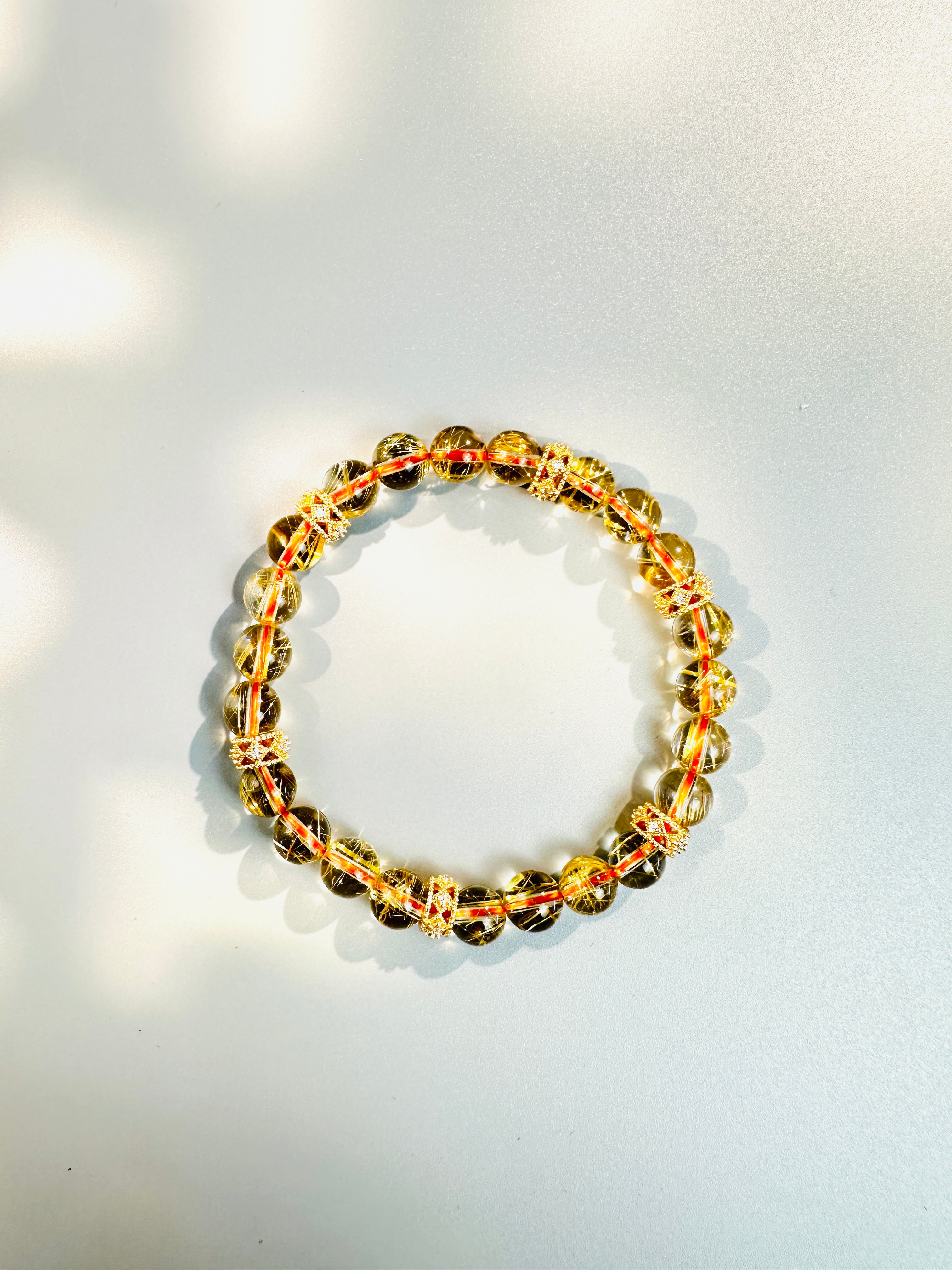 8mm Clear Titanium Rutilated Quartz Bracelet with Rose Gold Tone Spacers, Wealth Crystal