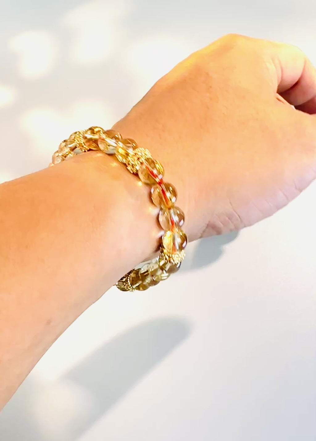 8mm Clear Titanium Rutilated Quartz Bracelet with Rose Gold Tone Spacers, Wealth Crystal
