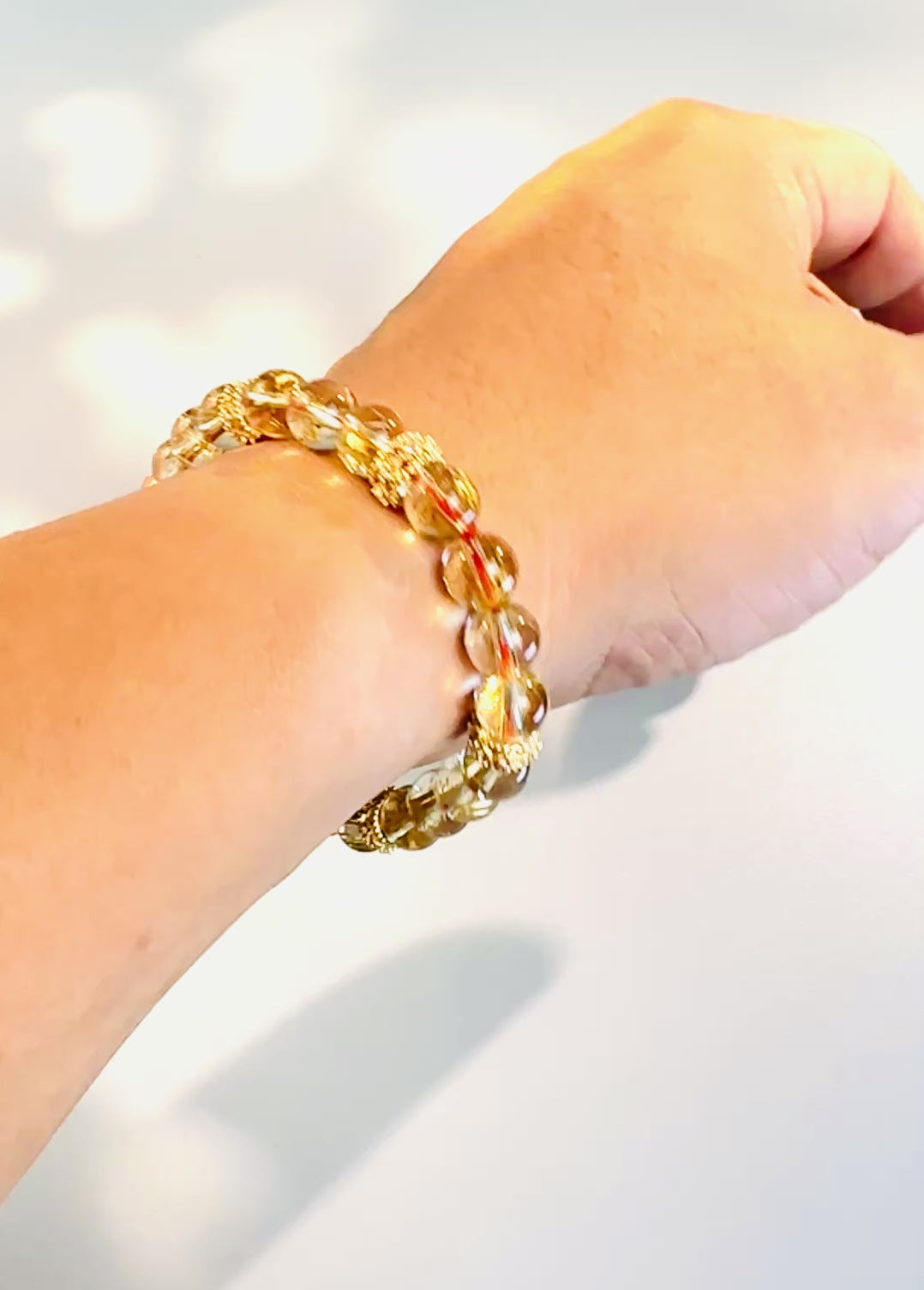 8mm Clear Titanium Rutilated Quartz Bracelet with Rose Gold Tone Spacers, Wealth Crystal